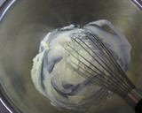 A picture of step 9 of Cocoa Crepe Roll Cake with Whole Strawberries.