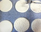 A picture of step 5 of Blueberry No-Bake Cheese Pies.