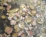 A picture of step 2 of Spicy tomato sausage soup.