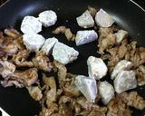 A picture of step 2 of Teriyaki Taro Roots and Pork.