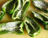 A picture of step 4 of Green Peppers Stuffed with Meat and Topped with Melted Cheese.