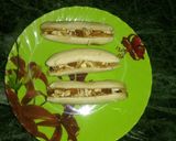 A picture of step 3 of Stuffed dry fruits banana roast.