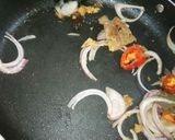 A picture of step 6 of Tender coconut and pomegranate cheesy pulao.