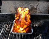 A picture of step 6 of Beer can chicken.