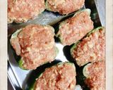 A picture of step 9 of Meat and Firm Tofu Stuffed Peppers.
