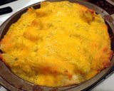 A picture of step 6 of Green Chile Cheesy Chicken Enchiladas.