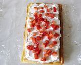 A picture of step 11 of Fluffy Waffle Roll Cake.