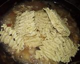 A picture of step 3 of Indomie with potato and dried fish.