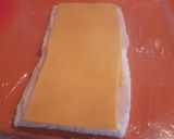 Foto del paso 3 de la receta Canapés de pan de molde con pechuga de pavo y queso cheddar