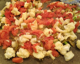 Foto del paso 1 de la receta: Paella de bacalao, coliflor y ajos tiernos