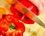 A picture of step 1 of Easy Creamy Tomato Sauce Stuffed Bell Peppers with Meat and Rice by TastyPinch.