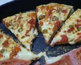 Foto del paso 7 de la receta: Pizza mita - mita (con 5 ingredientes básicos)