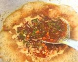 A picture of step 2 of Kathiyawadi masala khichadi.