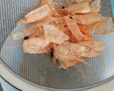 Foto del paso 3 de la receta: Calamares rellenos con langostinos Sabor Cookpad