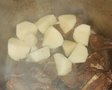 A picture of step 4 of Beef bones and pap.