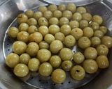 A picture of step 1 of Jhatpat khata meetha amla.