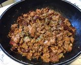 Une image de l'étape 12 de Porc aux tomates séchées, ail mariné, oignon et épices italiennes.