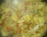 Foto del paso 4 de la receta: Guiso vegano de patatas al curry con guisantes y alubias blancas