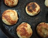 A picture of step 4 of Oil free Bread bonda in a paniyarum pan.