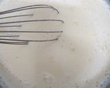 A picture of step 3 of Custard and Sandwich Bread Cake.