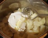 A picture of step 5 of Rich and Creamy Mashed Potatoes (in a pressure cooker!).