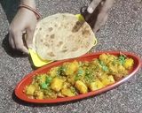 A picture of step 7 of Khatti meethi Aam aloo ki sabji.