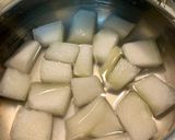 A picture of step 1 of Poosanikkai Mor Kootu (Ash gourd Mor Curry).