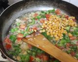 A picture of step 3 of Mexican rice.