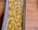 Foto del paso 1 de la receta: Pasta corta con tomate confitado, salchicha y burrata