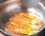 A picture of step 5 of Fried snake guard.