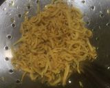 Foto langkah ke 1 dari resep Tumis Bunga Bawang Tempe Teri.