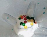 A picture of step 2 of Fruity Pebbles Milk Shake.