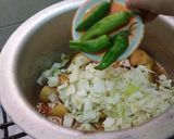 A picture of step 6 of Mix Vegi Pulao.