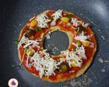 A picture of step 2 of Roti Pizza.