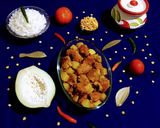 A picture of step 6 of Papaya and Fritters Curry.