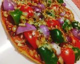 A picture of step 8 of Veg cheese Pasta Pizza.