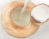 A picture of step 7 of Coconut pudding in real coconut.
