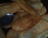 A picture of step 34 of Sugar coat khaja.