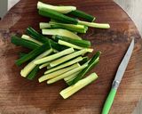 A picture of step 2 of Zucchini and Parmesan sticks.