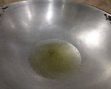 A picture of step 2 of Masala chicken.
