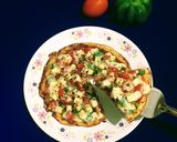 A picture of step 14 of Pan Paneer Pizza.