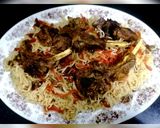 A picture of step 10 of Kabuli pulao.