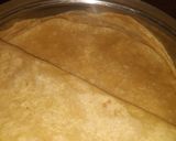 A picture of step 5 of Aamras and double layered Rotli.