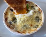 A picture of step 2 of King Charles’ Baked Eggs à la Med.