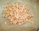 Foto del passaggio 4 della ricetta Risotto con zucca e gamberi e spicchi di limone