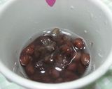 A picture of step 3 of Easy Zenzai Red Bean and Mochi Soup in a Microwave.