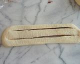 A picture of step 6 of Fluffy & Sticky Curly Anpan using a Bread Maker.