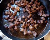 A picture of step 2 of Beef fry with fried rice.
