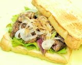 A picture of step 9 of Satisfying Beef Steak Sandwich.