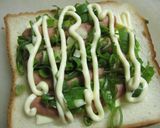 A picture of step 1 of Weiner Sausage Toasted Sandwich with Green Onions.